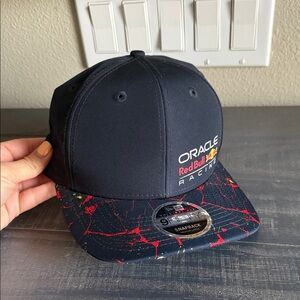 Oracle Red Bull Racing Black Snapback Hat with Red Paint-Splatter Brim
